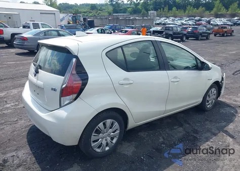 2015 Toyota Prius C One from USA, damaged, VIN JTDKDTB37F1094645